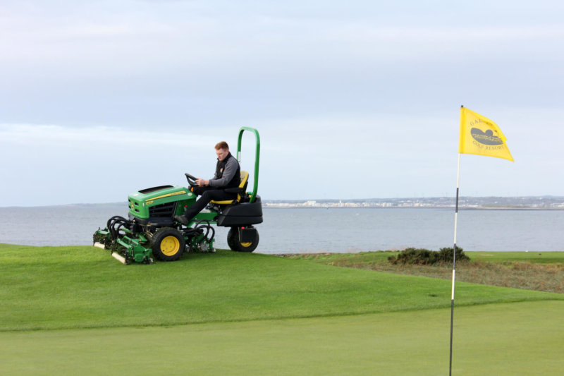 Gary Byrne driving the 2653B tees and surrounds mower. Photo: John Deere.