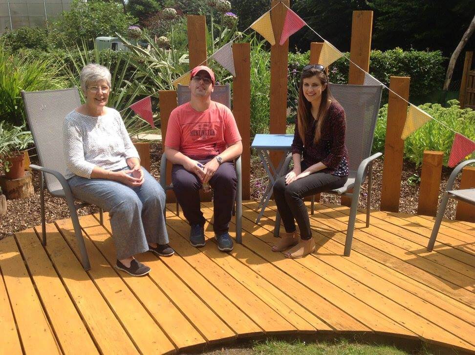 Pictured L/R: Mary O’Callaghan & Son, Richard O’Callaghan (CAA Service User) pictured with CAA Fundraising Coordinator Carol Walsh, enjoying a relaxing day in the sun at the 2017 Open Gardens event. Photo: Carol Walsh.